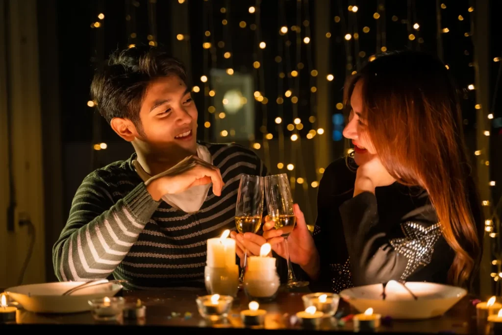Couple enjoying a cozy night in, one of many romantic at-home date ideas