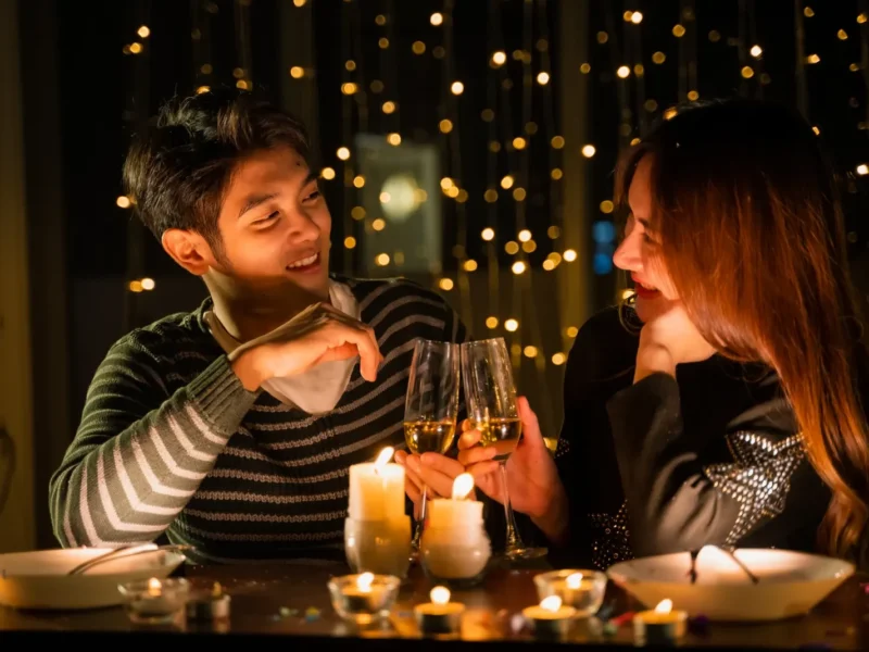 Couple enjoying a cozy night in, one of many romantic at-home date ideas