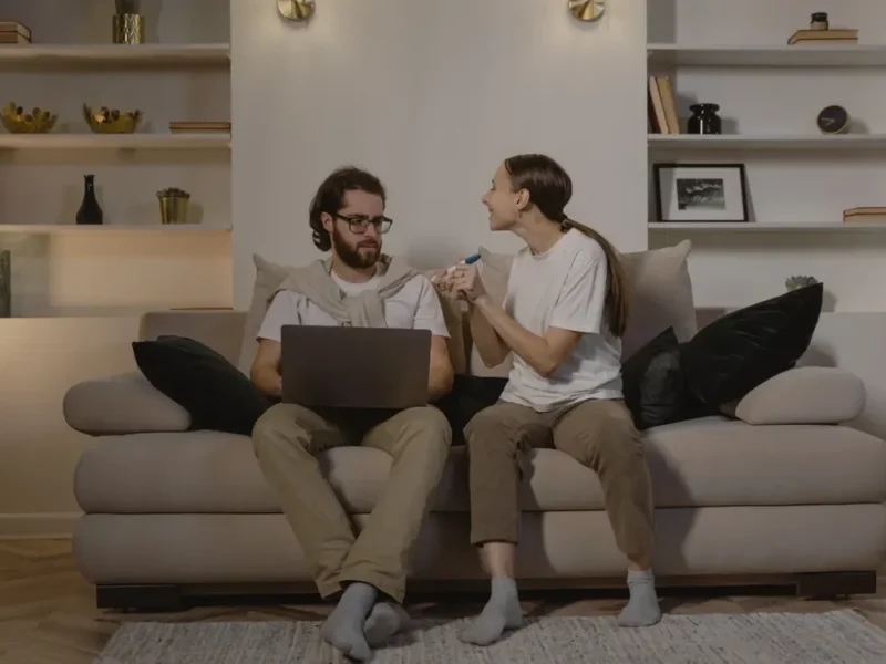 Couple talking calmly at home, learning to express your feelings without arguments