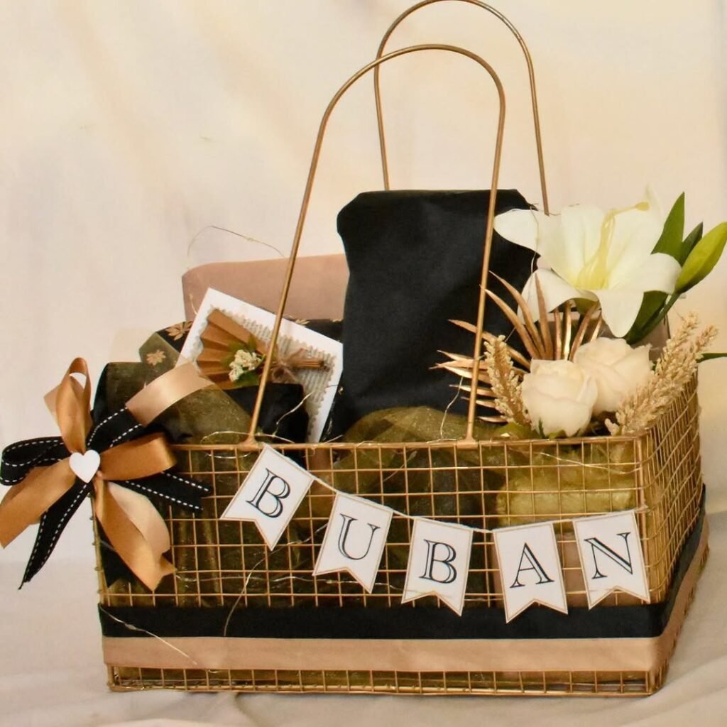 Luxury gold basket hamper for a man with flowers and gifts
