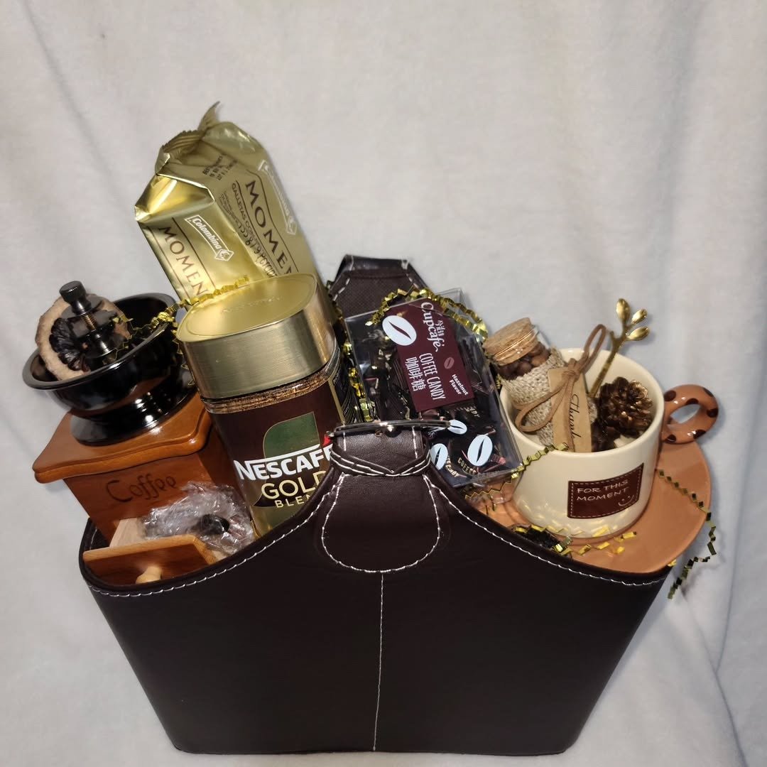 Woven coffee gift basket with coffee jar, bag and mug