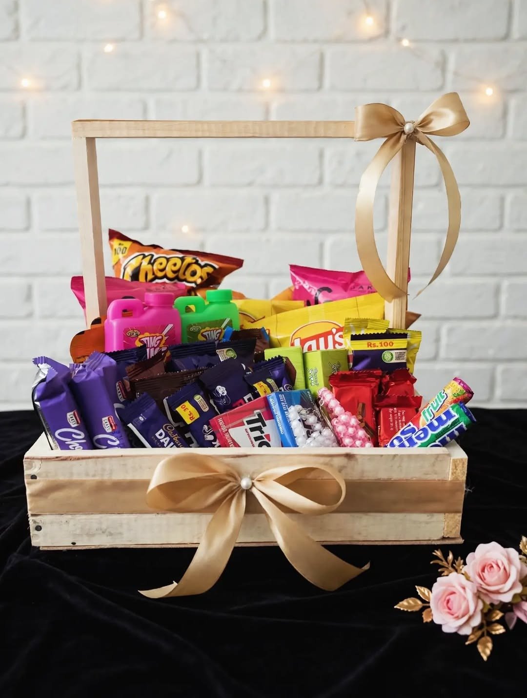 Basket overflowing with chips, candy and drinks
