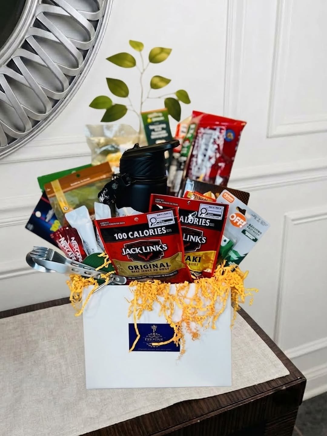 Outdoor gift box with jerky, bottle and trail snacks