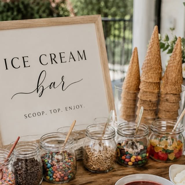 Homemade ice cream sundae bar with colorful toppings on a counter