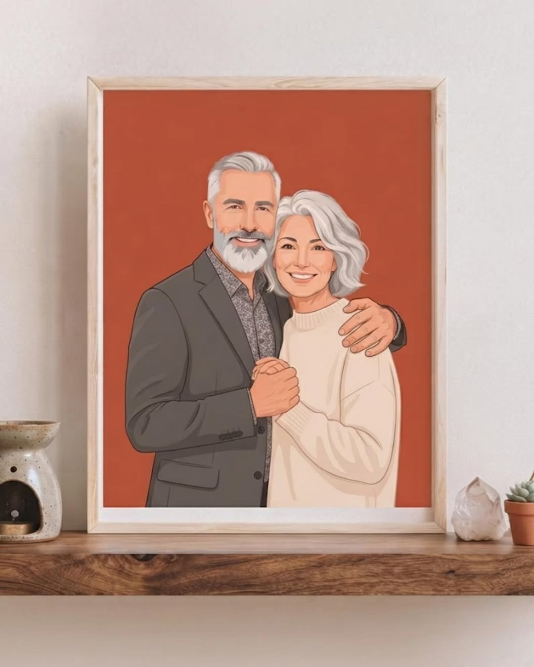 Framed couple portrait illustration on shelf, from our personalized gifts for couples guide