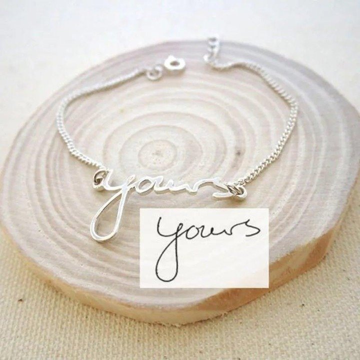Bracelet with handwritten word engraving on wood slice