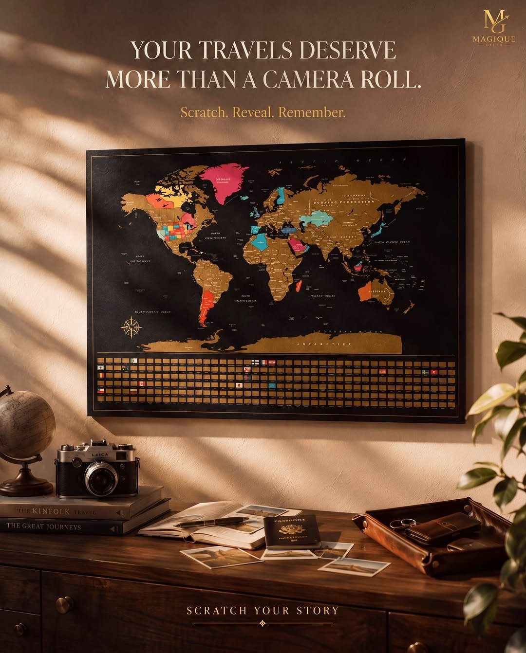 Framed scratch-off world map above desk