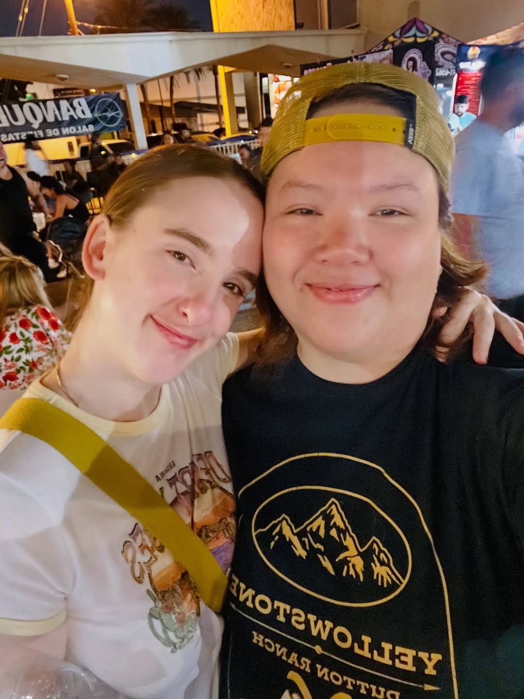 Couple selfie at night food market