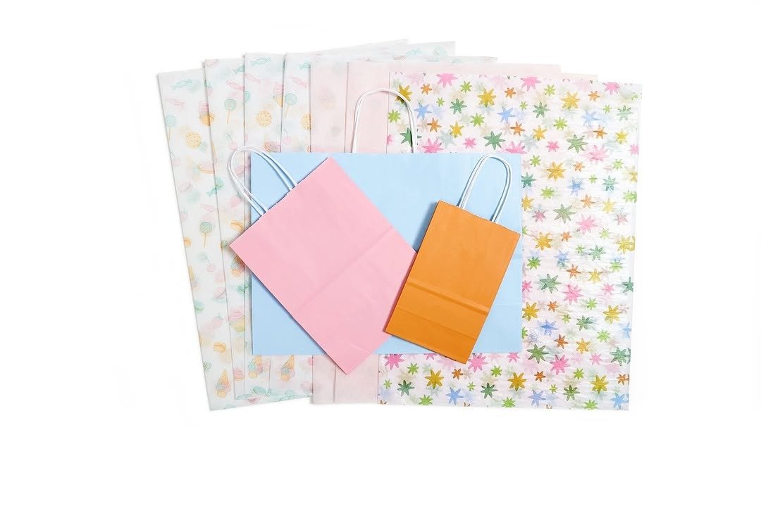 Plain solid colour gift bags with tissue paper