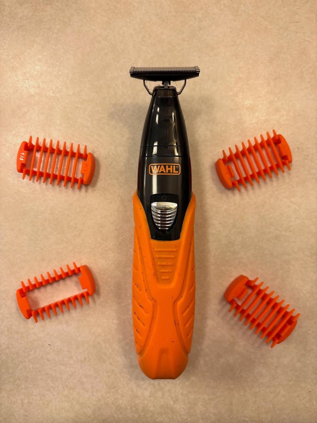 Wahl beard trimmer with guide combs flat lay