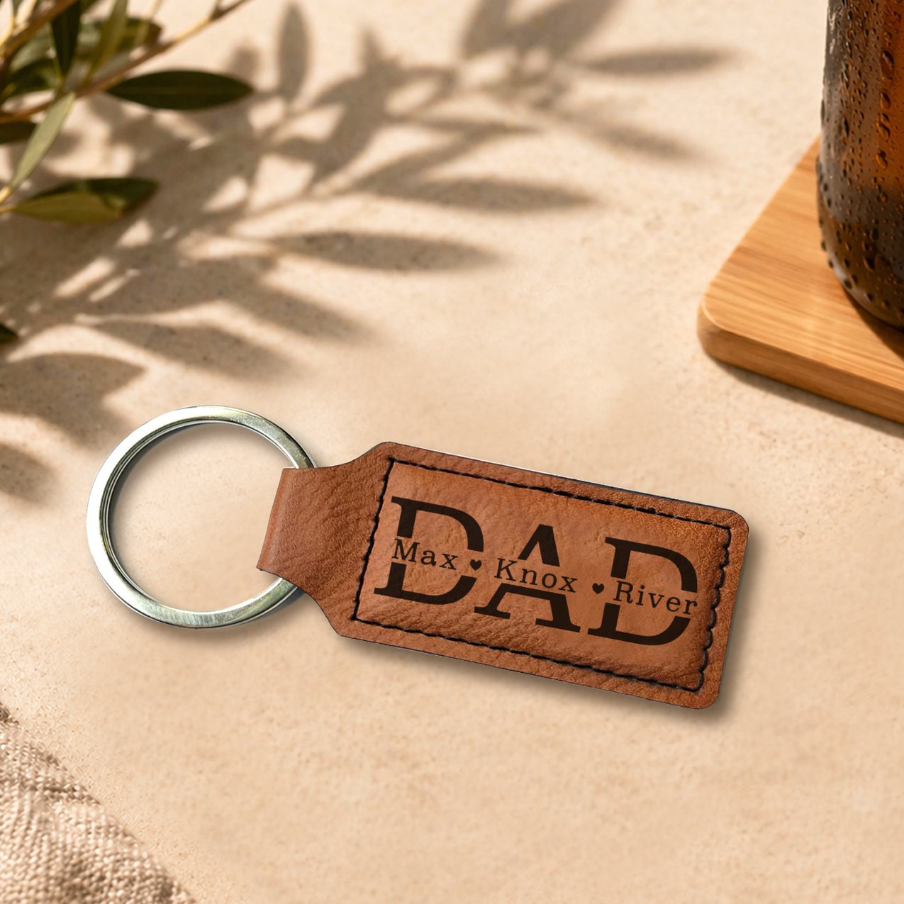 Tan leather keyring engraved with names