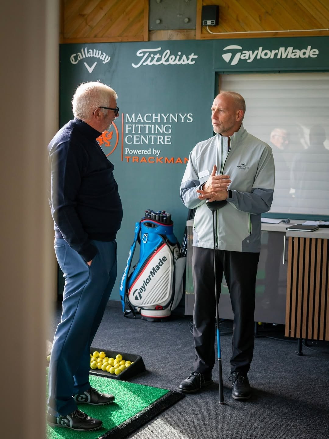 Golf club fitting session indoors