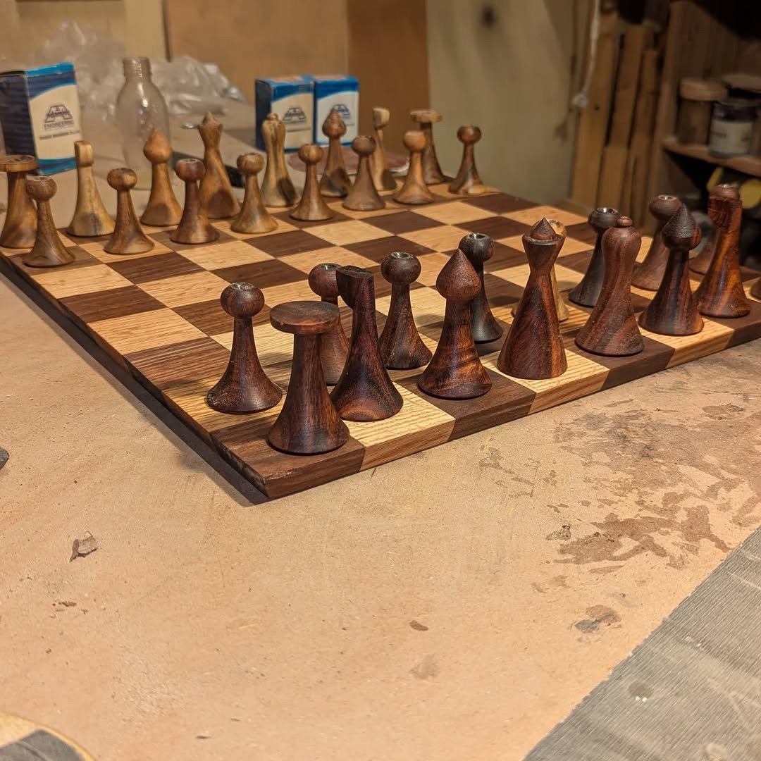 Hand-turned walnut and oak chess set on board