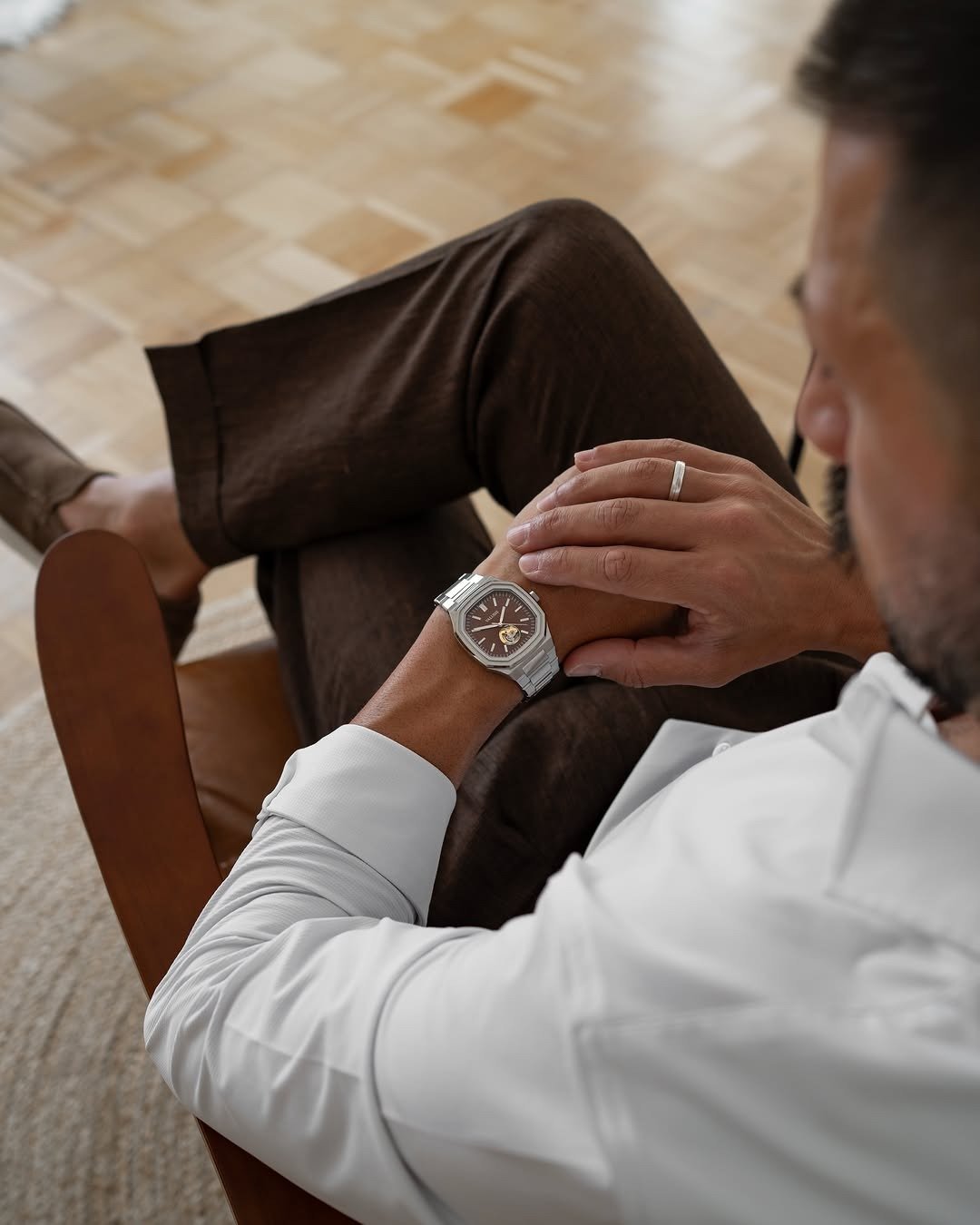 Automatic watch with open heart movement on wrist