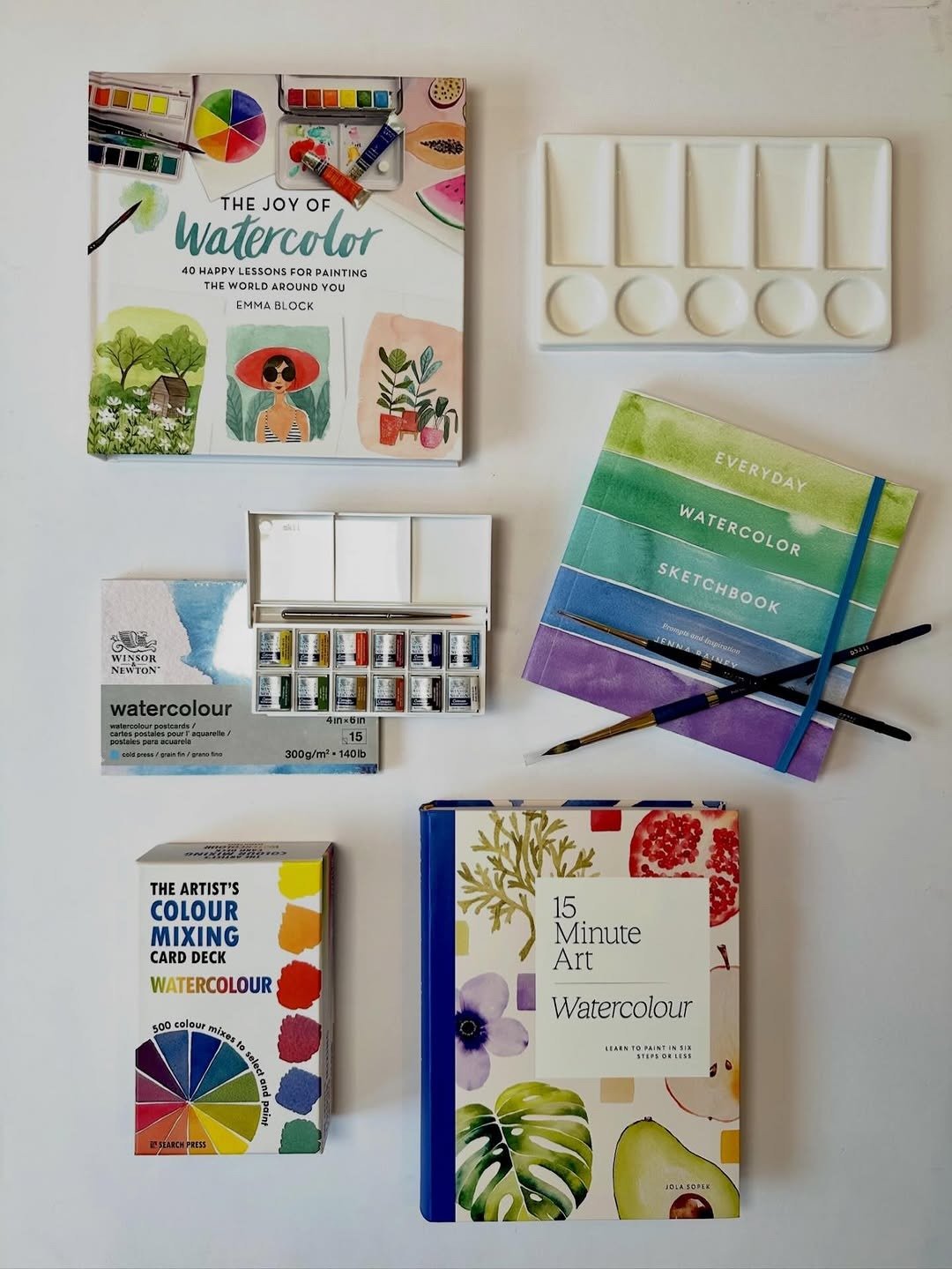 Premium watercolor art supplies flat lay
