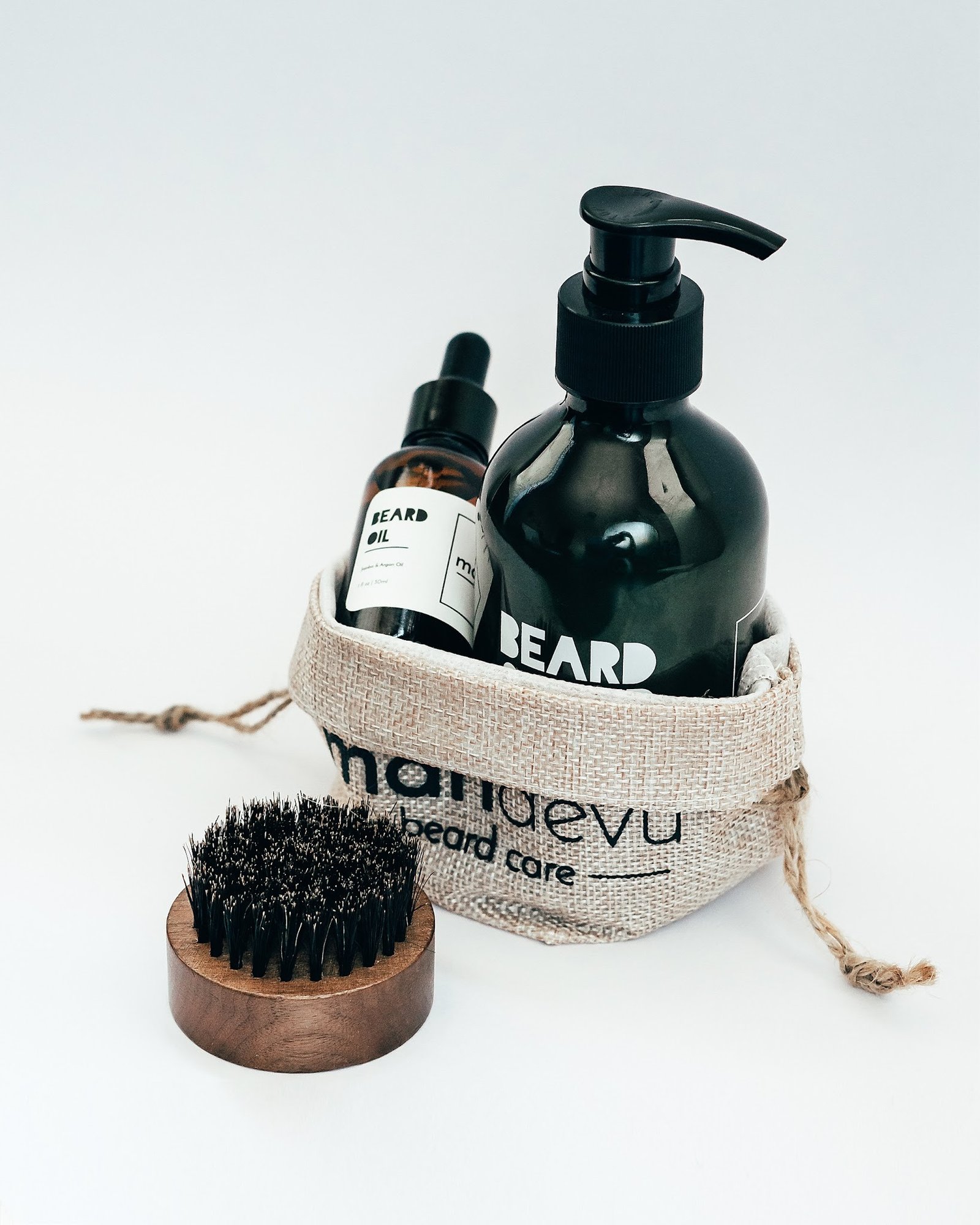 Beard wash, oil and brush grooming kit in pouch