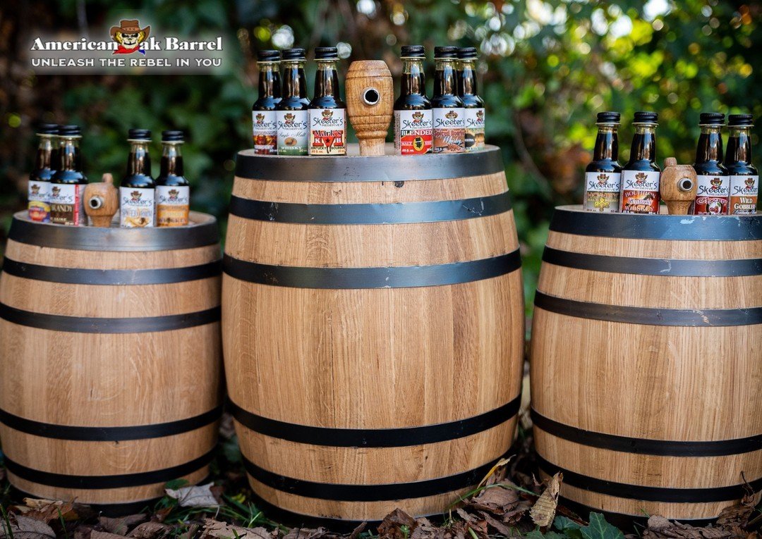 Oak aging barrels with flavor essence bottles