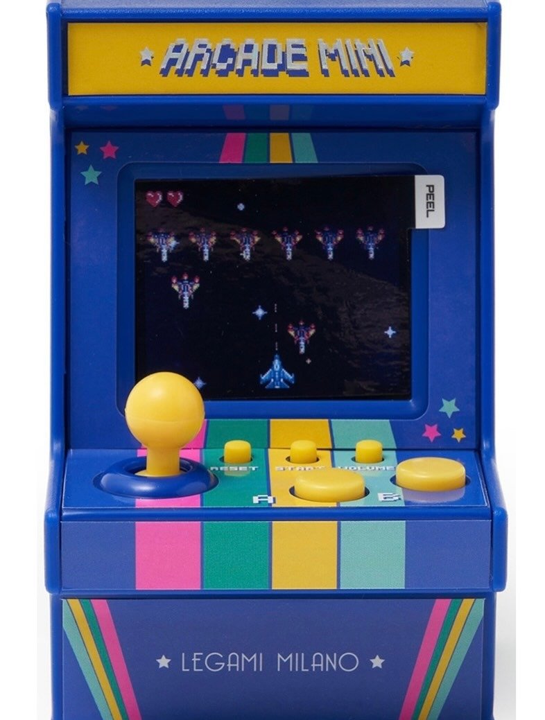 Blue mini arcade machine with joystick close-up