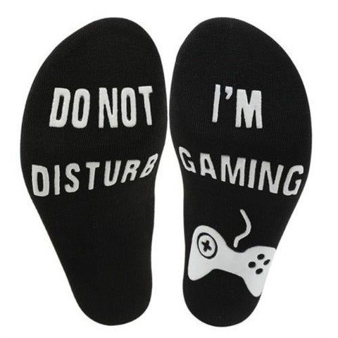 Black gaming statement socks on white background