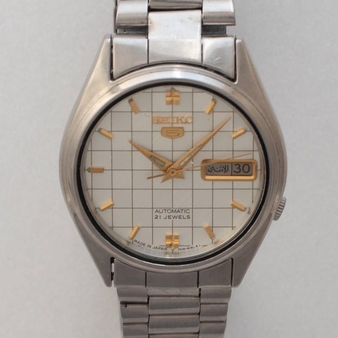 Vintage Seiko 5 automatic watch on steel bracelet